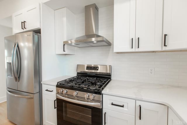 271 Riverside Dr, Lynchburg, VA 24503 - kitchen featuring stainless steel appliances, wall chimney exhaust hood, white cabinets, decorative backsplash, and light stone countertops