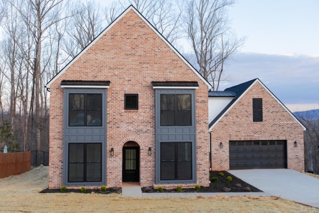 271 Riverside Dr, Lynchburg, VA 24503 - view of front of home with concrete driveway, brick siding, and an attached garage