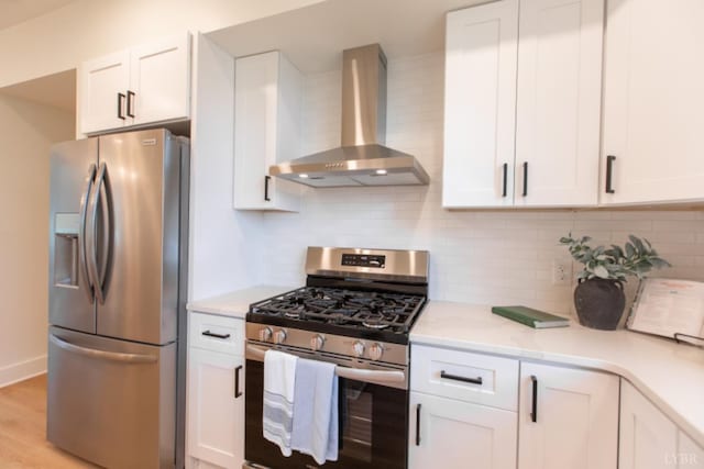 271 Riverside Dr, Lynchburg, VA 24503 - kitchen featuring wall chimney range hood, stainless steel appliances, light countertops, and white cabinets