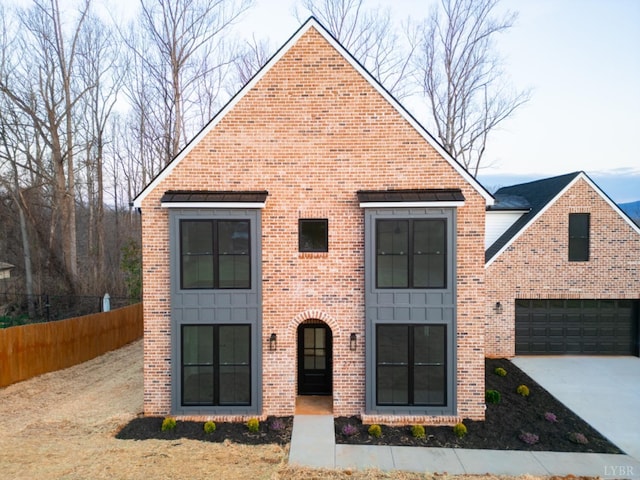 271 Riverside Dr, Lynchburg, VA 24503 - view of front of house featuring brick siding, concrete driveway, and a garage