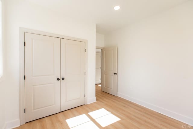 271 Riverside Dr, Lynchburg, VA 24503 - unfurnished bedroom with light wood-style flooring, recessed lighting, and a closet