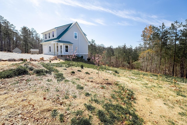 355 Camellia, Hurt, VA 24563 - view of side of property with a wooded view