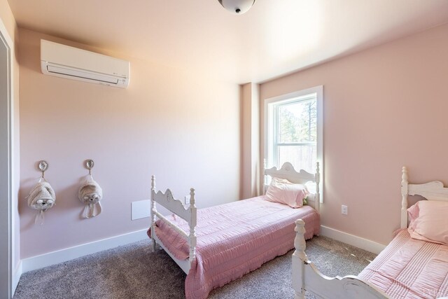 355 Camellia, Hurt, VA 24563 - bedroom featuring baseboards, carpet, and an AC wall unit