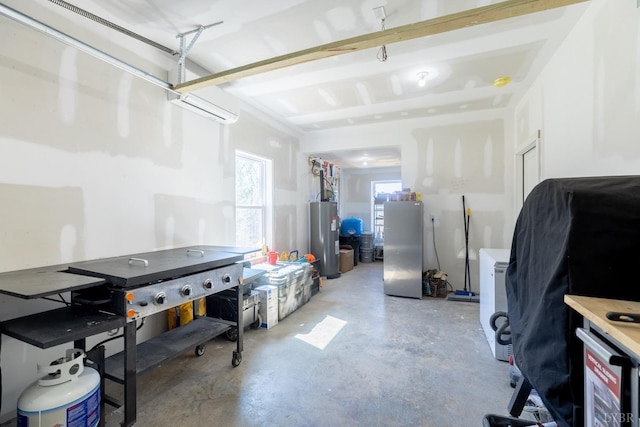 355 Camellia, Hurt, VA 24563 - garage with electric water heater and freestanding refrigerator