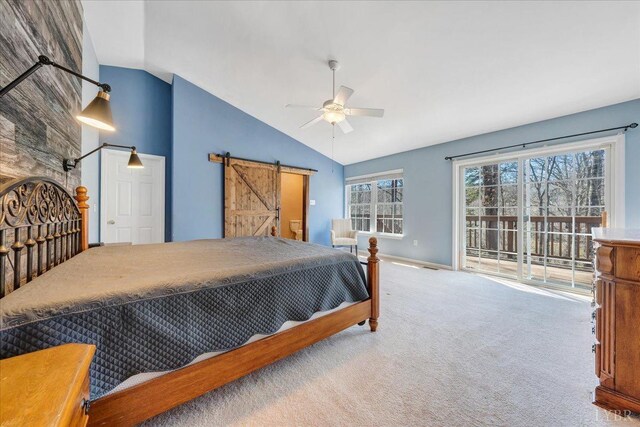 200 Inlet Dr, Wirtz, VA 24184 - bedroom with vaulted ceiling, access to exterior, a barn door, carpet, and baseboards