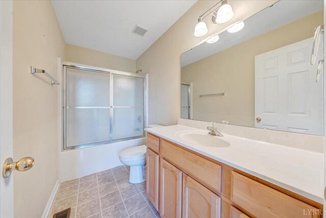 200 Inlet Dr, Wirtz, VA 24184 - bathroom with toilet, vanity, and shower / bath combination with glass door