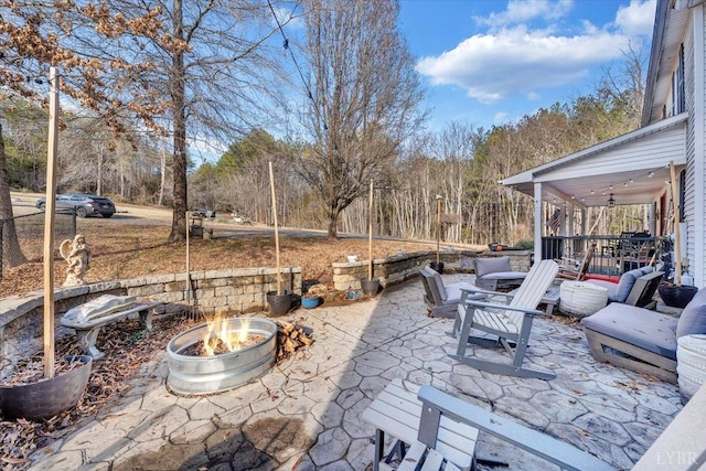 1014 Tall Tree Rd, Wirtz, VA 24184 - view of patio / terrace with a ceiling fan and an outdoor living space with a fire pit