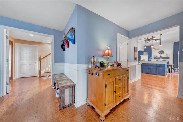 1014 Tall Tree Rd, Wirtz, VA 24184 - hallway with light wood-style flooring and stairs