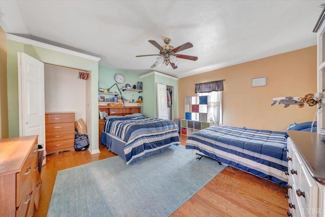 1014 Tall Tree Rd, Wirtz, VA 24184 - bedroom with wood finished floors, ceiling fan, and crown molding