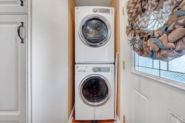 1014 Tall Tree Rd, Wirtz, VA 24184 - clothes washing area featuring stacked washing machine and dryer