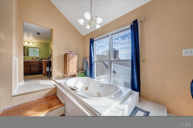 1014 Tall Tree Rd, Wirtz, VA 24184 - bathroom featuring lofted ceiling, vanity, a chandelier, and a jetted tub