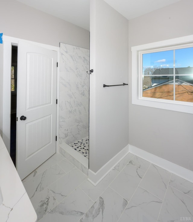 3936 Moorman Dr, Lynchburg, VA 24501 - full bathroom with tiled shower, marble finish flooring, and baseboards
