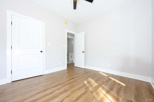 3936 Moorman Dr, Lynchburg, VA 24501 - unfurnished bedroom featuring light wood-style flooring, baseboards, and a ceiling fan