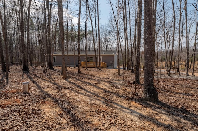 1381 Moccasin Path Trl, Huddleston, VA 24104 - view of front facade featuring a wooden deck