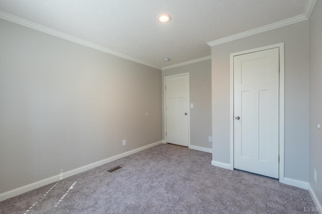 1381 Moccasin Path Trl, Huddleston, VA 24104 - unfurnished bedroom with baseboards, carpet flooring, visible vents, and ornamental molding