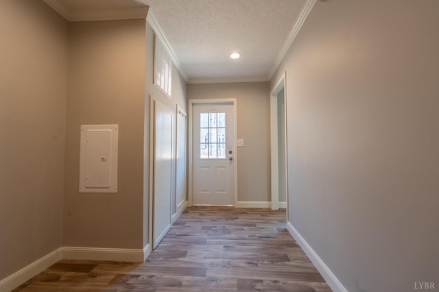 1381 Moccasin Path Trl, Huddleston, VA 24104 - doorway with crown molding, baseboards, wood finished floors, and electric panel