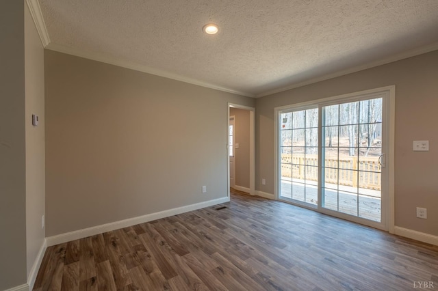 1381 Moccasin Path Trl, Huddleston, VA 24104 - spare room with ornamental molding, a textured ceiling, and dark wood-type flooring