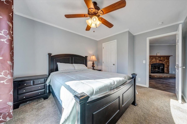 1309 Gate Ln, Moneta, VA 24121 - carpeted bedroom featuring baseboards, a ceiling fan, crown molding, and a stone fireplace