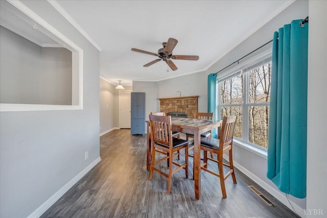 1309 Gate Ln, Moneta, VA 24121 - dining room with crown molding, baseboards, and visible vents