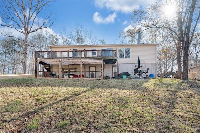 1309 Gate Ln, Moneta, VA 24121 - rear view of property featuring a wooden deck and a yard
