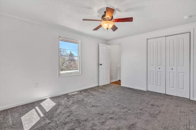 1330 Springfield Dr, Vinton, VA 24179 - unfurnished bedroom featuring ornamental molding, a textured ceiling, carpet flooring, a closet, and ceiling fan