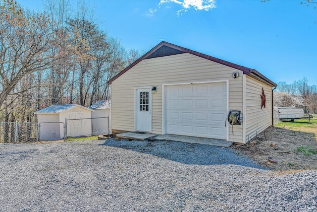 1330 Springfield Dr, Vinton, VA 24179 - detached garage featuring fence and driveway