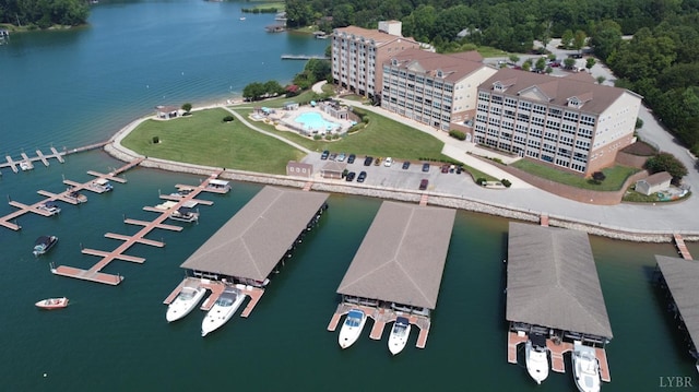 birds eye view of property with a water view