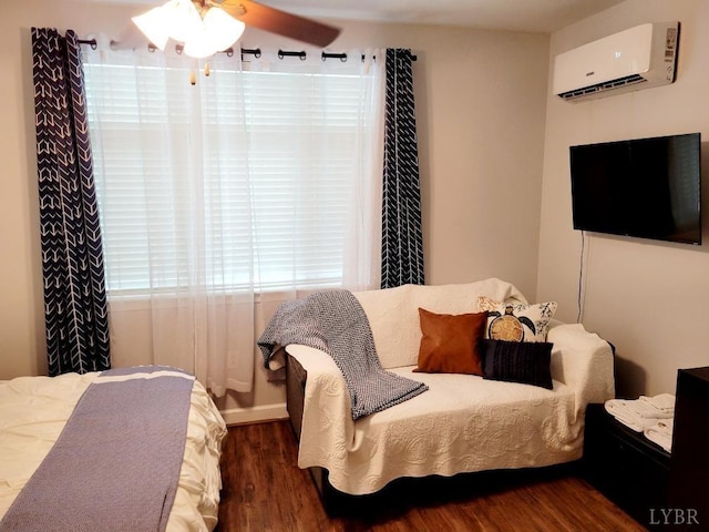 1245 Graves Harbor Dr Unit 2103, Huddleston, VA 24104 - bedroom with a ceiling fan, a wall mounted air conditioner, and wood finished floors