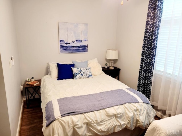 1245 Graves Harbor Dr Unit 2103, Huddleston, VA 24104 - bedroom with baseboards and wood finished floors