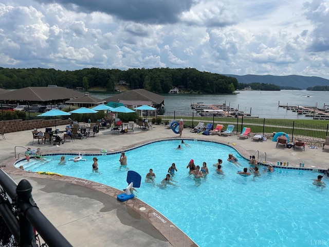 1245 Graves Harbor Dr Unit 2103, Huddleston, VA 24104 - view of pool featuring a water view, fence, and a patio area