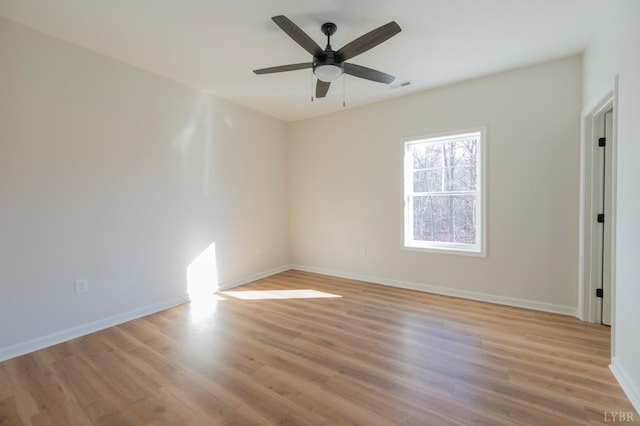 128 Brenleigh Ct Unit 102, Lynchburg, VA 24501 - empty room featuring light wood-type flooring, ceiling fan, and baseboards