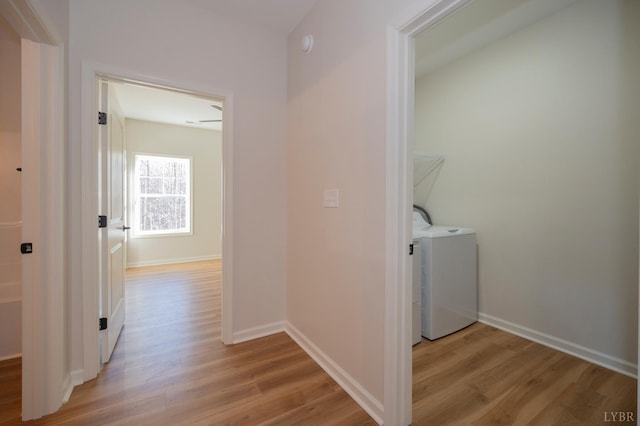 128 Brenleigh Ct Unit 102, Lynchburg, VA 24501 - washroom featuring light wood-style flooring, independent washer and dryer, and baseboards