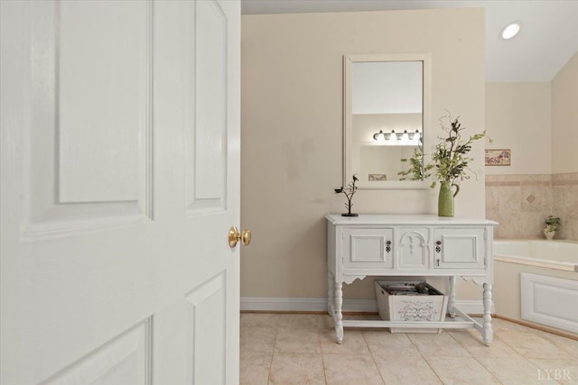 352 Wild Turkey Rd, Lynchburg, VA 24502 - bathroom with a garden tub, tile patterned flooring, and vanity