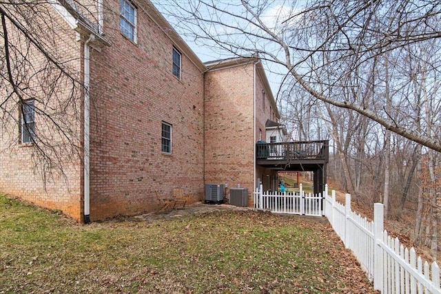 352 Wild Turkey Rd, Lynchburg, VA 24502 - view of side of property featuring a fenced backyard, a deck, and brick siding