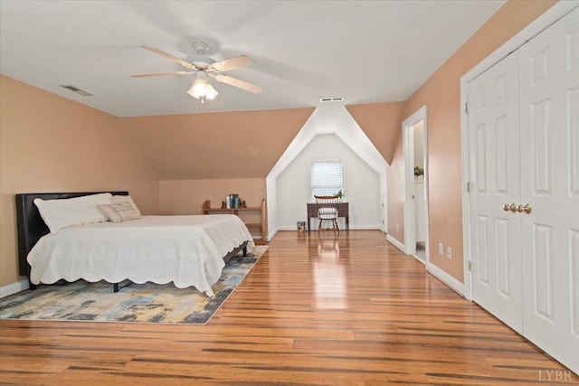 352 Wild Turkey Rd, Lynchburg, VA 24502 - bedroom with wood finished floors, vaulted ceiling, a closet, and a ceiling fan