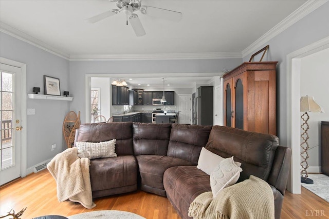 352 Wild Turkey Rd, Lynchburg, VA 24502 - living area with light wood-type flooring, crown molding, and a ceiling fan