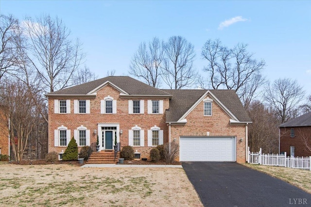 352 Wild Turkey Rd, Lynchburg, VA 24502 - view of front of home featuring asphalt driveway, brick siding, and a shingled roof