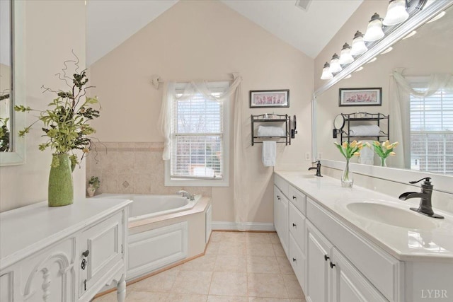 352 Wild Turkey Rd, Lynchburg, VA 24502 - full bath featuring lofted ceiling, double vanity, a garden tub, and tile patterned flooring