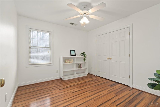 352 Wild Turkey Rd, Lynchburg, VA 24502 - unfurnished bedroom featuring wood finished floors, a closet, and a ceiling fan