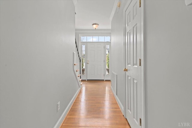 352 Wild Turkey Rd, Lynchburg, VA 24502 - doorway to outside with ornamental molding, light wood finished floors, and stairway