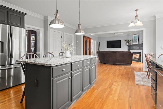 352 Wild Turkey Rd, Lynchburg, VA 24502 - kitchen with stainless steel fridge, ornamental molding, a fireplace, a kitchen island, and ceiling fan