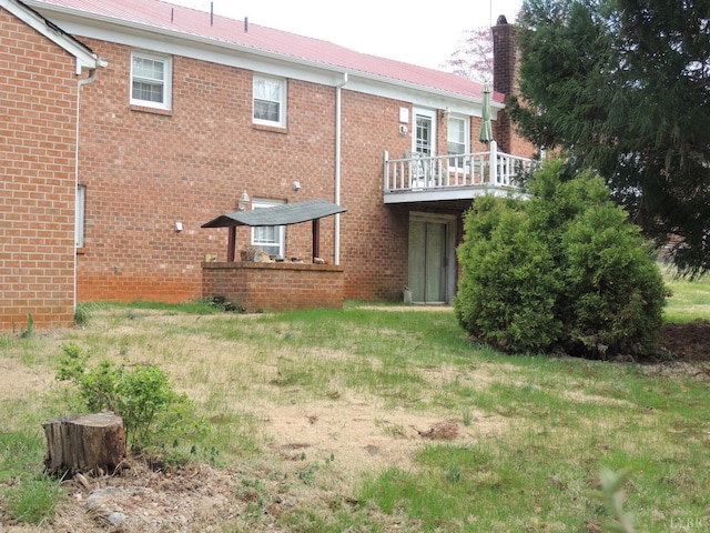 723 Custer Dr, Lynchburg, VA 24502 - rear view of property with brick siding and a chimney