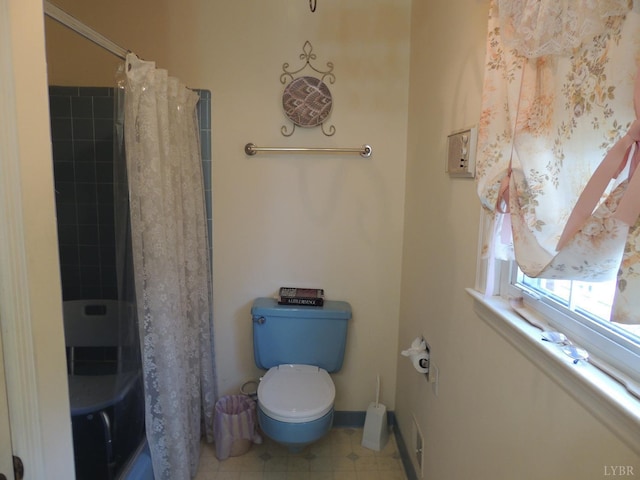 723 Custer Dr, Lynchburg, VA 24502 - bathroom with a shower with curtain, toilet, and baseboards