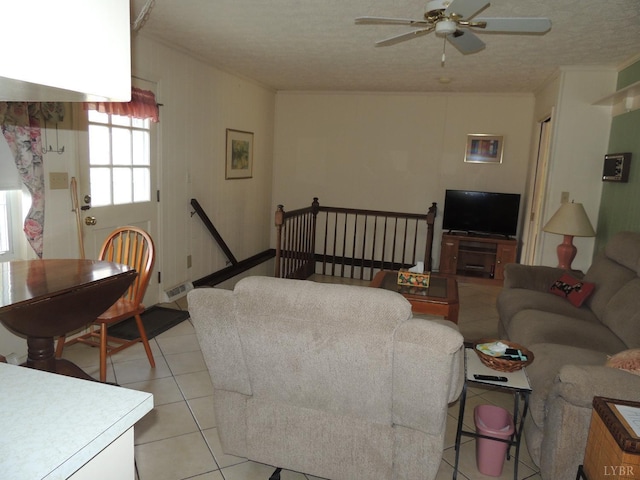 723 Custer Dr, Lynchburg, VA 24502 - living room featuring light tile patterned flooring, a textured ceiling, crown molding, and a ceiling fan