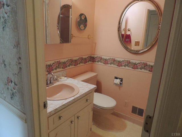 723 Custer Dr, Lynchburg, VA 24502 - half bathroom featuring visible vents, toilet, and vanity