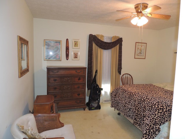 723 Custer Dr, Lynchburg, VA 24502 - carpeted bedroom with a ceiling fan and a textured ceiling