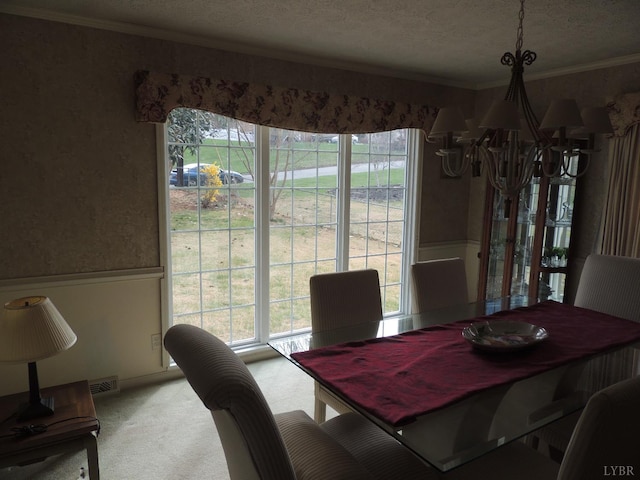 723 Custer Dr, Lynchburg, VA 24502 - dining area featuring a textured ceiling, crown molding, a healthy amount of sunlight, and a notable chandelier