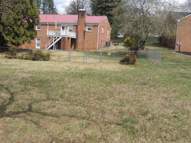 723 Custer Dr, Lynchburg, VA 24502 - view of yard featuring a fenced backyard, cooling unit, a gate, and stairway