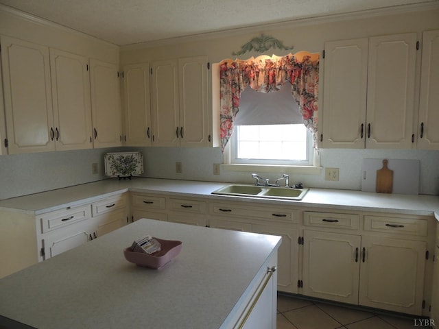 723 Custer Dr, Lynchburg, VA 24502 - kitchen with white cabinets, light countertops, and a sink