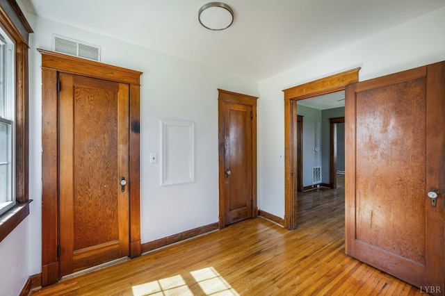 501 W Spencer Rd, Hurt, VA 24563 - unfurnished bedroom featuring light wood-style flooring and baseboards